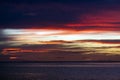 Beautiful dark red sunset over Pacific ocean Royalty Free Stock Photo