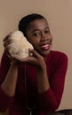 Beautiful famele holding lion mane mushroom Royalty Free Stock Photo