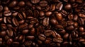 Beautiful dark texture of roasted coffee beans. Close-up view. Royalty Free Stock Photo