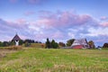 Beautiful purple dawn house upland landscape. Royalty Free Stock Photo