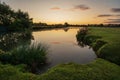 Beautiful dawn landscape image of River Thames at Lechlade-on-Thames in English Cotswolds countryside Royalty Free Stock Photo