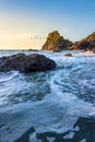 Beautiful dawn landscape over Kynance Cove in Corwnall England with vibrant sky and beautiful turquoise ocean