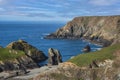 Beautiful dawn landscape over Kynance Cove in Corwnall England with vibrant sky and beautiful turquoise ocean