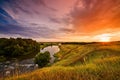 Beautiful dawn on the river and view of the field