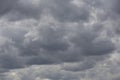 Beautiful day cloudscape view from below of dramatic dramatic grey and white thunder storm clouds on a dark sky background Royalty Free Stock Photo