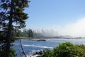 Beautiful day with misty seascape views of the rocky shoreline on the outside coast of Ucluelet facing the Pacific Ocean. Royalty Free Stock Photo