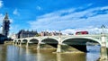 London cityscape with Big Ben, Westminster Bridge, and classic double-decker.