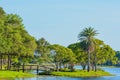 A beautiful day for a walk and the view of the wood bridge to the island at John S. Taylor Park in Largo, Florida. Royalty Free Stock Photo