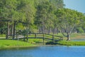 A beautiful day for a walk and the view of the wood bridge to the island at John S. Taylor Park in Largo, Florida. Royalty Free Stock Photo