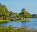 A beautiful day for a walk and the view of the wood bridge to the island at John S. Taylor Park in Largo, Florida. Royalty Free Stock Photo