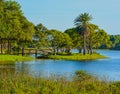 A beautiful day for a walk and the view of the wood bridge to the island at John S. Taylor Park in Largo, Florida. Royalty Free Stock Photo