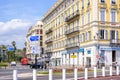 Beautiful daylight view to city of Nice. Yellow building and cars driving on street.B Royalty Free Stock Photo