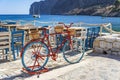 Beautiful decorated bicycle at the coastal village of Gerolimenas and the old harbor. It is a small picturesque fishing village in