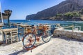 Beautiful decorated bicycle at the coastal village of Gerolimenas and the old harbor. It is a small picturesque fishing village in