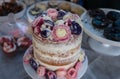 Beautiful decorated cake with cream roses Royalty Free Stock Photo