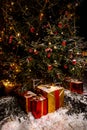 Beautiful decorated christmas tree with present boxes in a winter concept Royalty Free Stock Photo