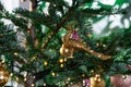 Beautiful decorated Christmas tree. with various hanging Christmas balls on the tree, Christmas background, gold and pink balls