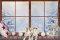 Merry Christmas and Happy Holidays! A beautiful decorated for Christmas window. Winter forest from the window of the house. Royalty Free Stock Photo