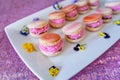 Beautiful decorated pink macaroon cookies filled with pink creme.