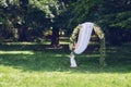 Beautiful decorated romantic place -wedding arch for wedding ceremony in summer park