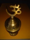 Beautiful decorative brass oil lamp in dark background.