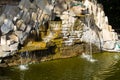 Beautiful decorative garden stone waterfall pond Royalty Free Stock Photo