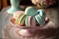 Beautiful decorative pastel colored French macaroons on dish