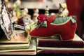 Beautiful decorative red Shoe made of material in the flea market Royalty Free Stock Photo