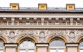 Beautiful decorative stucco on facade of old house. Kyiv, Mykhailivska Street