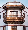 Beautiful decorative wooden balconies on a traditional Canarian house. Royalty Free Stock Photo