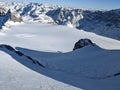 beautiful deep snow tracks from the clariden mountain down towards the glacier firn. Uri Glarus Switzerland Royalty Free Stock Photo