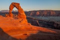 The beautiful Delicate Arch glowing red at sunset in Arches National Park Royalty Free Stock Photo