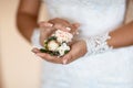 Beautiful delicate flower wedding bouquet with white and pink roses in the hands of the bride, morning of the bride, close-up, sel Royalty Free Stock Photo