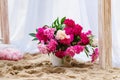 Beautiful, delicate wedding decorations with candles and fresh flowers on the beach Royalty Free Stock Photo