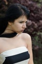 Beautiful depressed girl standing outdoor on strong windy day Royalty Free Stock Photo