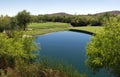 Beautiful desert golf course with lake Royalty Free Stock Photo