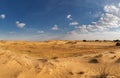 Beautiful desert landscape with dunes. Walk on a sunny day on the sands