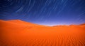 beautiful desert at night with a starry night with lights Royalty Free Stock Photo