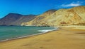 Beautiful deserted lonely pacific ocean bay, empty sand beach, turquoise water, barren arid desert mountains - North Chile, Royalty Free Stock Photo