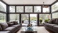 Wide-Angle Shot of Modern House Sunroom Living Area with Mid-Century Minimalistic Interior Design and Open Concept Layout . Royalty Free Stock Photo