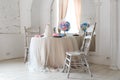 Beautiful design of the wedding table for the newlyweds. light luxury interior