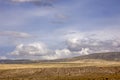 The beautiful and desolate plateau meadow at the foot of the mountain