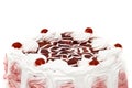 Beautiful dessert - iced cake with cherries Royalty Free Stock Photo