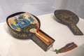 Beautiful details of an old fan with a Chinese scene in blue ceramics in the Museo Nacional de Ceramica in Valencia, Spain