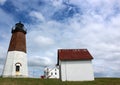 Welcoming scene of blue skies, puffy clouds and beloved lighthouse, Point Judith, Rhode Island, 2018 Royalty Free Stock Photo