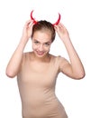 Beautiful devil girl with hot chili pepper Royalty Free Stock Photo