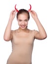 Beautiful devil girl with hot chili pepper Royalty Free Stock Photo