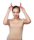 Beautiful devil girl with hot chili pepper Royalty Free Stock Photo