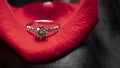 beautiful diamond ring on a red rose petal Royalty Free Stock Photo