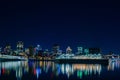 Beautiful Dieppe Park port night skyline with colorful light reflections on the river